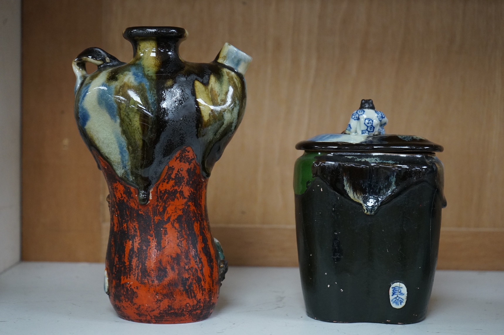 A Japanese Sumida pottery vase and a similar jar and cover, largest 21cm high